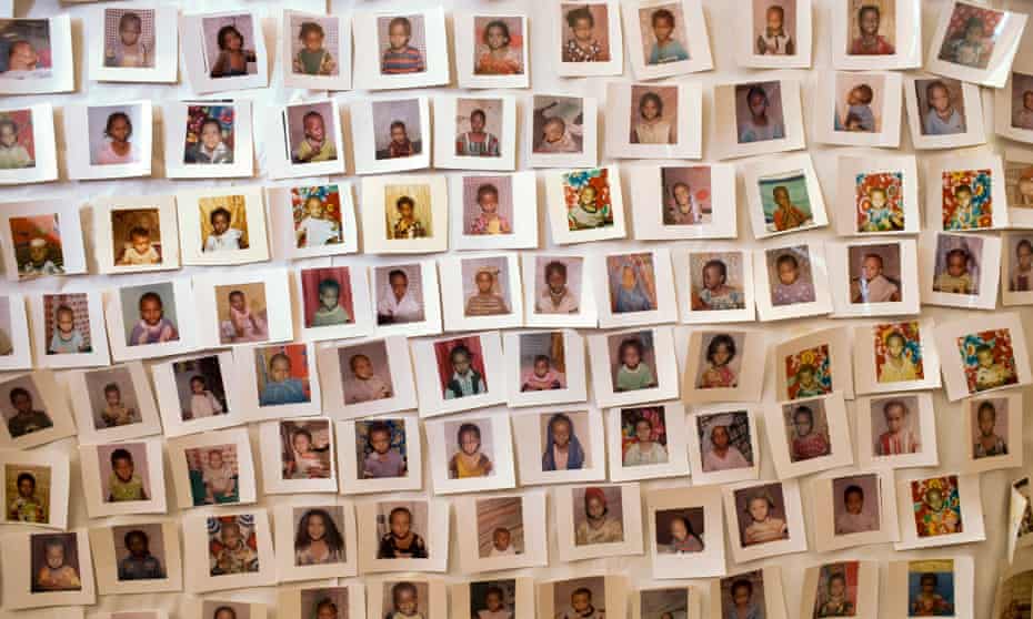 Dozens of photographs of girls who were spared the FGM/C procedure are displayed in an office in Awash Sebat Kilo, Ethiopia.