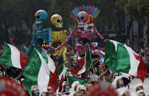 Performers participate in the Day of the Dead parade on Mexico City’s main Reforma Avenue