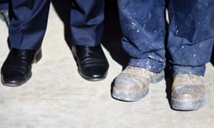 Australian prime minister Malcolm Turnbull stands next to a worker as he visits advanced manufacturer Omni Tanker, Sydney, Australia, 19 May 2016.