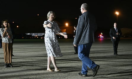 Elizabeth Whelan greets her brother Paul Whelan as he arrives at Joint Base Andrews in Maryland.