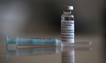 AstraZeneca Covid-19 vaccine bottle next to a syringe