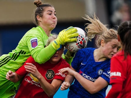 Mary Earps of Manchester United catches the ball over Millie Turner of Manchester United and Erin Cuthbert of Chelsea in the Barclays FA Women’s Super League, London, UK, 17 Nov 2019