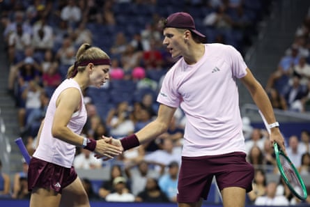 Karolína Muchová and Jakub Menšík celebrate a point during Wednesday’s match.