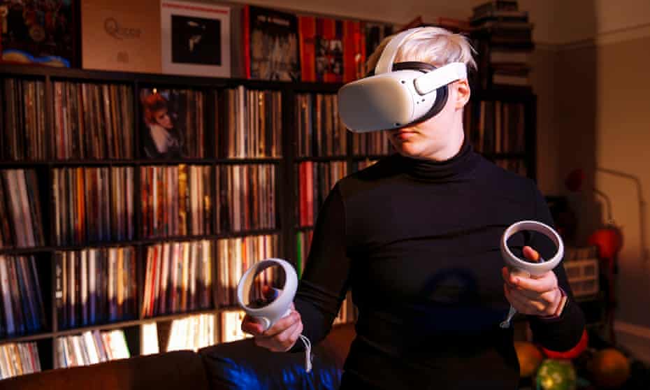 Keza Macdonald uses a VR headset at home in Glasgow, Scotland.