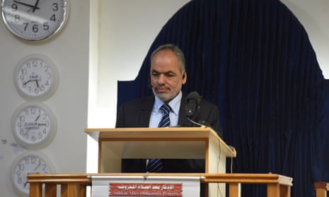 Parramatta mosque chairman Neil El-Kadomi speaks to worshippers at a prayer meeting on Friday.
