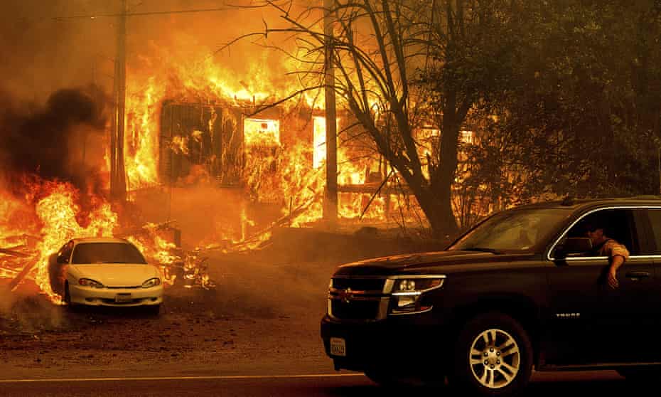 Flames from the Dixie fire consume a home on Highway 89 south of Greenville.