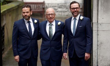 Rupert Murdoch poses for a photograph with his sons Lachlan, left, and James at St Bride’s church to celebrate the wedding of Murdoch Jerry Hall in London in 2016. The couple have since divorced.