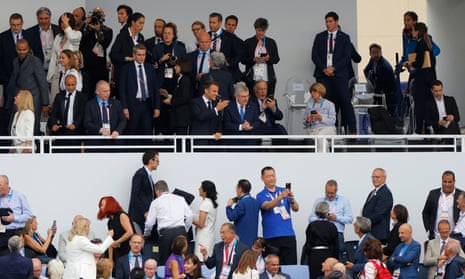 French President Emmanuel Macron and International Olympic Committee (IOC) President Thomas Bach gesture ahead of the opening ceremony the Opening Ceremony of the 2024 Paris Summer Olympic Games at the Trocadero.