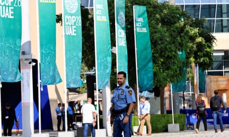 A UN security officer on patrol during Cop28 in Dubai.