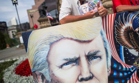 Trump supporter with painting of the president before the start of the Republican National Convention in Cleveland, Ohio