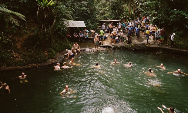 Passengers take a dip in a natural pool on Fiji