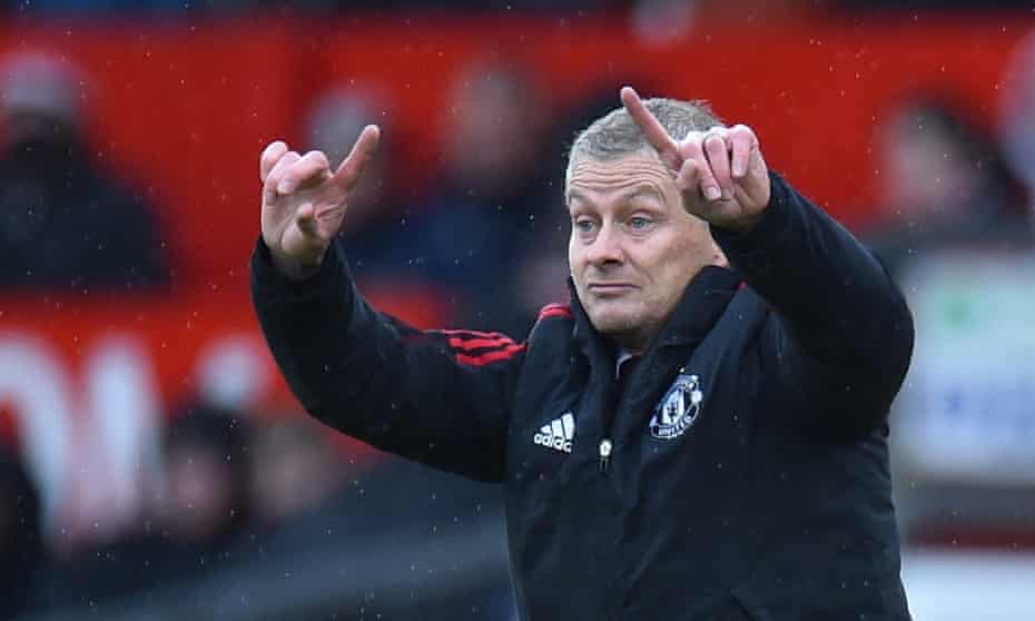 Ole Gunnar Solskjær on the touchline, signalling instructions to his team during the 2-0 defeat by Manchester City