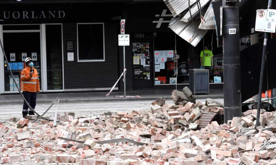 Bricks cover the footpath outside a Chapel Street building damaged in the earthquake.