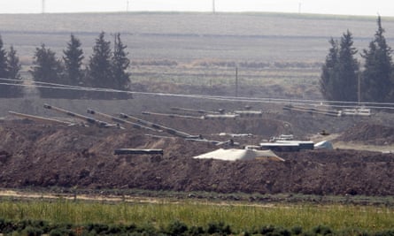 Turkish forces artillery pieces are seen on their new positions near the border with Syria in Sanliurfa province.