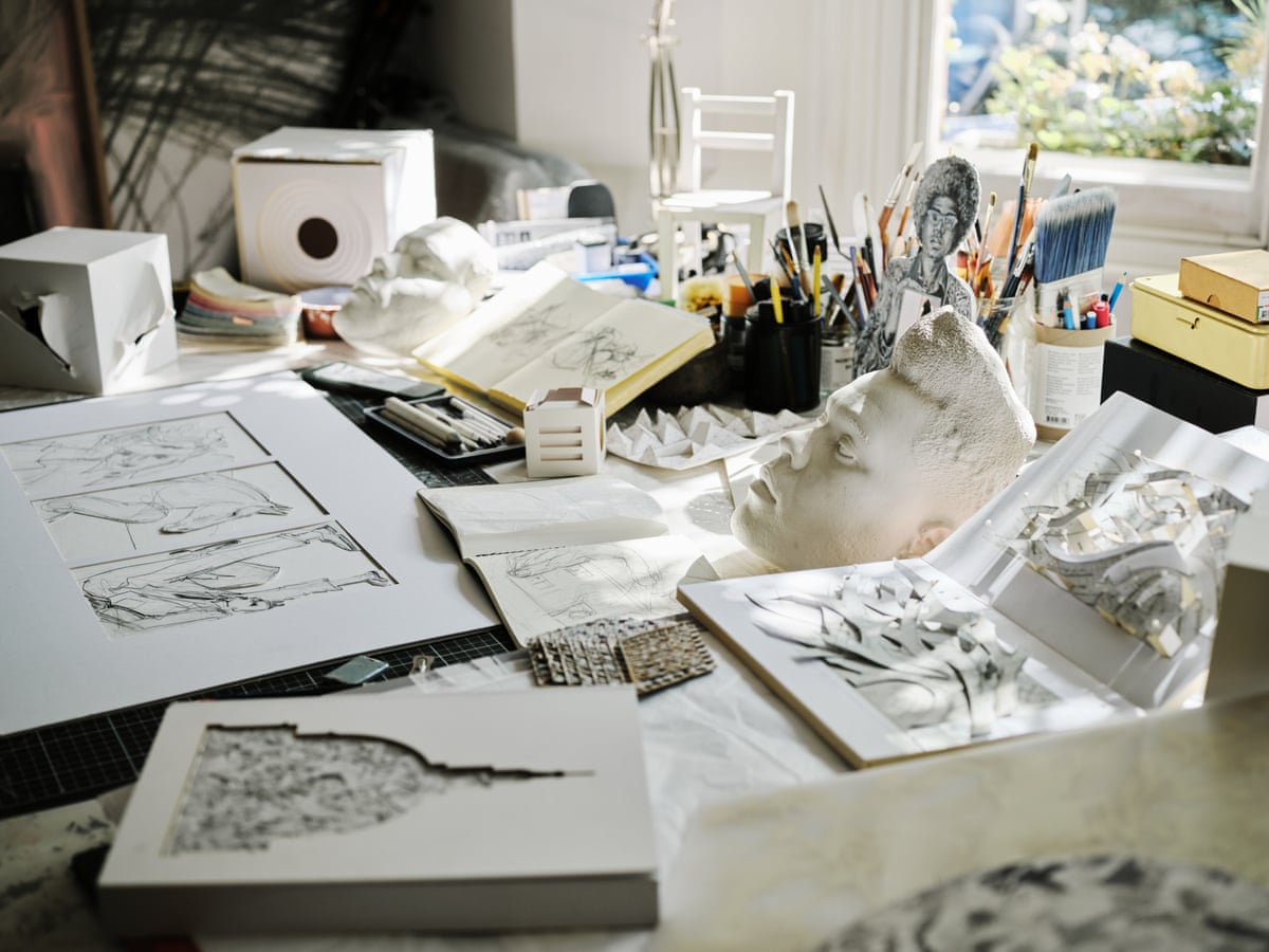 A table with sketches, models and drawing tools
