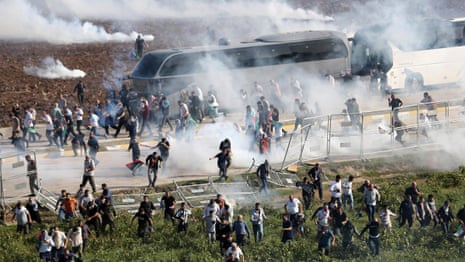 Turkish police fire tear gas and water cannon as pro-Palestine protesters storm US base – video