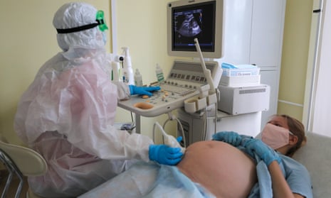A pregnant woman undergoes an ultrasound scan in a Russian hospital.