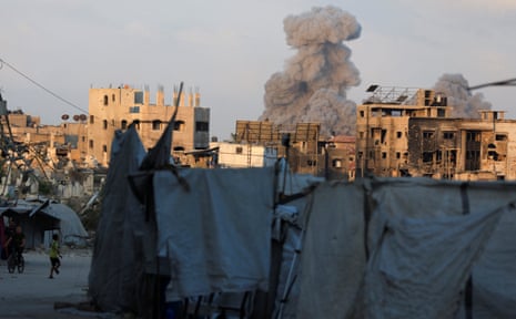 Smoke rises following an Israeli strike, in Gaza City, August 21, 2025.
