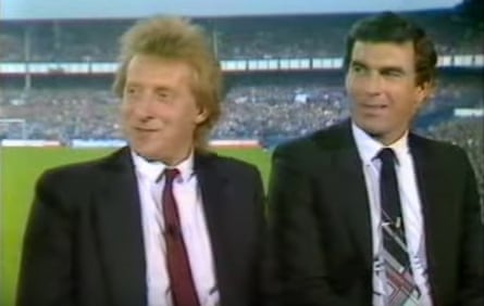 Pundits Denis Law (left) and Trevor Brooking at Goodison Park.