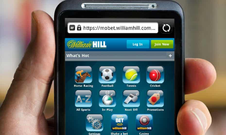 Checking a bookmakers website on a smartphone