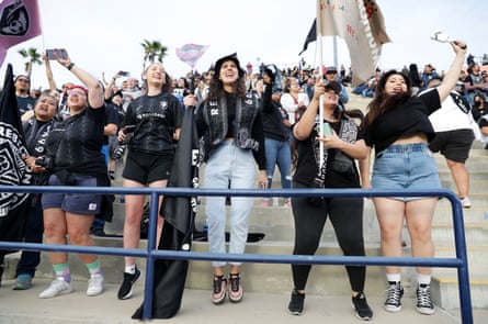 Angel City FC supporter groups cheer on their team against San Diego Wave.