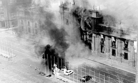 Coup … Smoke pours from the Chilean presidential palace after being hit by rockets launched from Hawker Hunters.