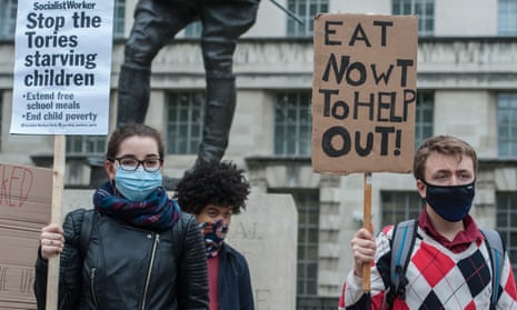 School students and educators protest outside Downing Street against the government decision not to extend free school meals during holidays