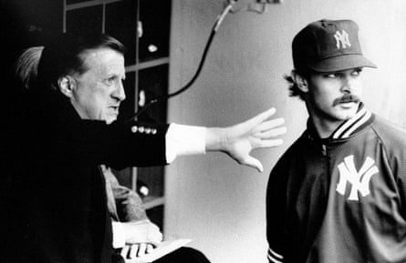 George Steinbrenner gives some advice to first baseman Don Mattingly before a game.
