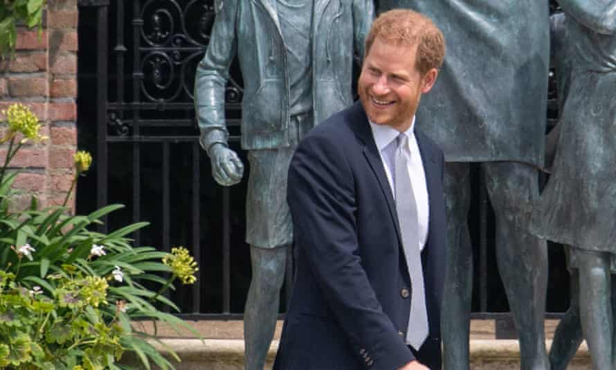 Harry smiles looking back