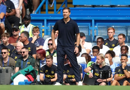 Xabi Alonso standing on the Chelsea sideline