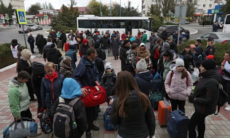 Civilians removed from the Russian-controlled Kherson region of Ukraine arrive in Dzhankoi in northern Crimea.
