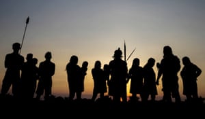 Members of the indigenous Xikrin ethnic group dance during a celebration in the hamlet of Mrotidjam, in the indigenous reserve of Trincheira do Bacaja, state of Para, northern Brazil, on 20 September 2019.