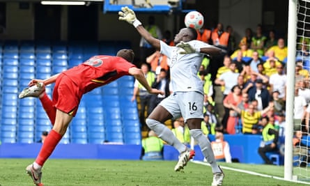 Dan Gosling heads the ball past Chelsea’s Edouard Mendy for Watford in their Premier League match at Stamford Bridge in London on 22 May, 2022.