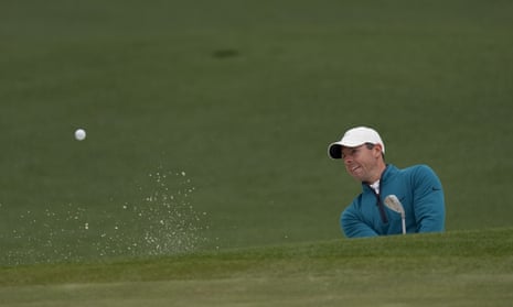 Rory McIlroy escapes from a bunker at the 2nd hole on Saturday.