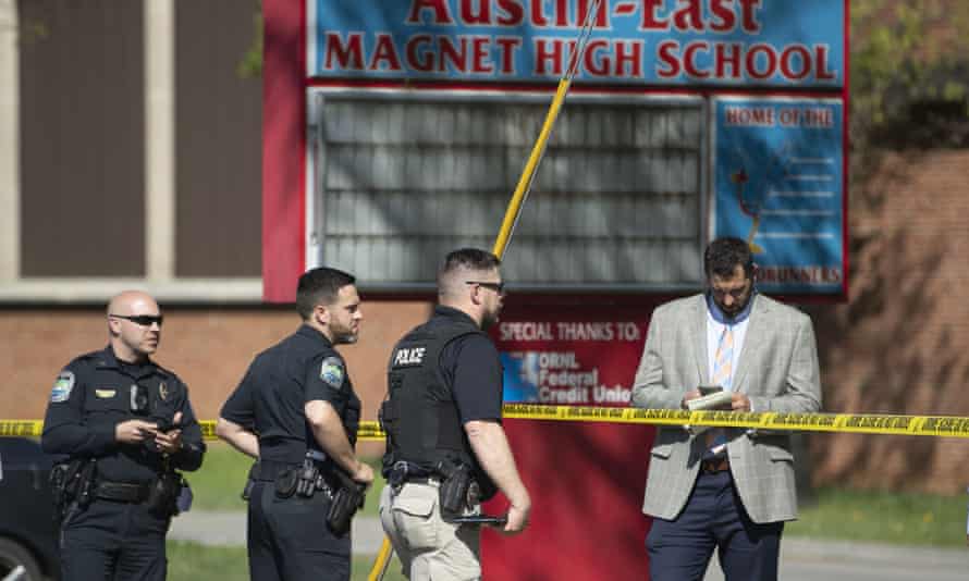 Law enforcement officers respond to the shooting.