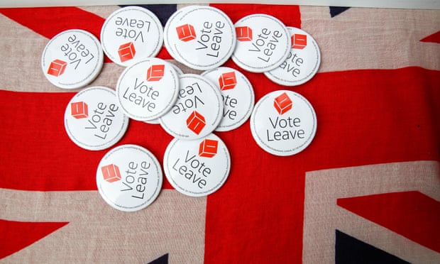 Vote Leave badges displayed at a rally before the referendum on the European Union