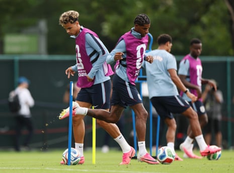 Nico O'Reilly (left) and Marcus Rashford in training