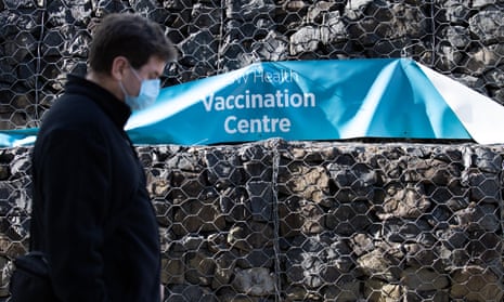 A man waiting outside NSW Health vaccination centre in Homebush, Sydney
