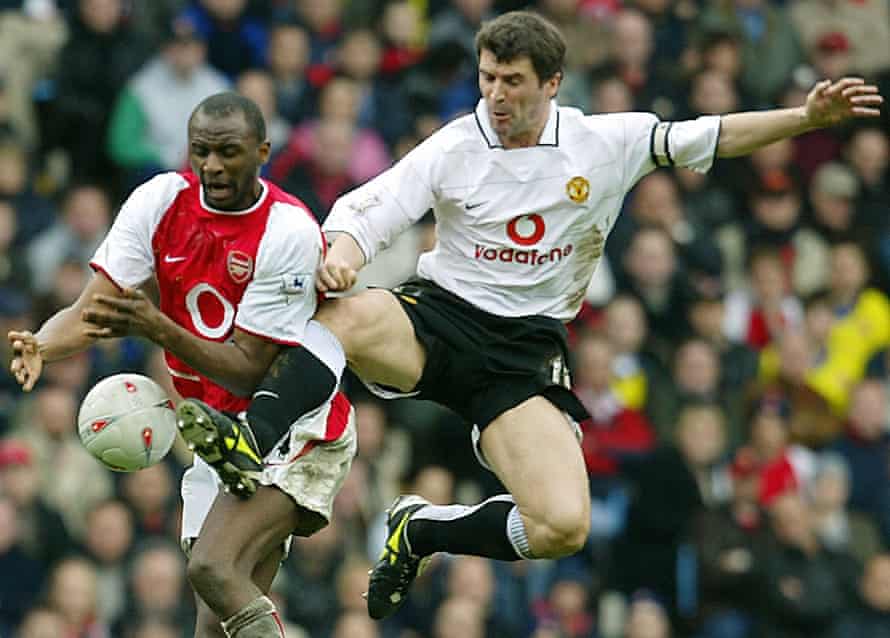 Manchester United’s Roy Keane, right, and Arsenal’s Patrick Vieira battle for the ball in 2004.