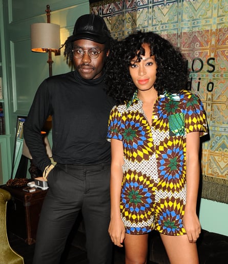 Musicians Dev Hynes and Solange Knowles standing together