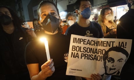 Protest Against Jair Bolsonaro, in Sao Paulo, Brazil - 26 Jun 2021<br>Mandatory Credit: Photo by Cris Faga/NurPhoto/REX/Shutterstock (12171294j) Demonstrators during a protest against Bolsonaro’s administration on June 26, 2021 in Sao Paulo, Brazil. Brazilian president Jair Bolsonaro is facing a probe for pandemic mismanagement as the country counts over 500,000 deaths of COVID. The controversial decision to host the Copa America 2021 amid the coronavirus crisis is questioned by a large part of the population. Protest Against Jair Bolsonaro, in Sao Paulo, Brazil - 26 Jun 2021