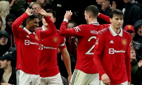 Manchester United's Marcus Rashford celebrates scoring a goal with Harry Maguire and Wout Weghorst that was later disallowed.