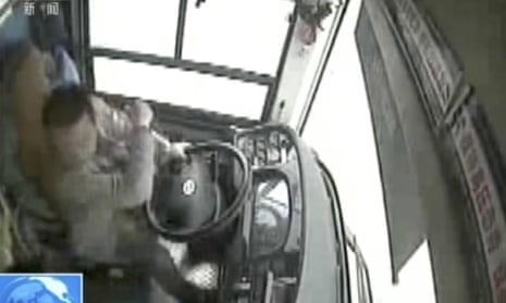 CCTV footage shows the fight breaking out at the front of the bus in Chongqing