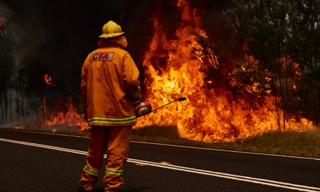 A CFA Member works on controlled back burns