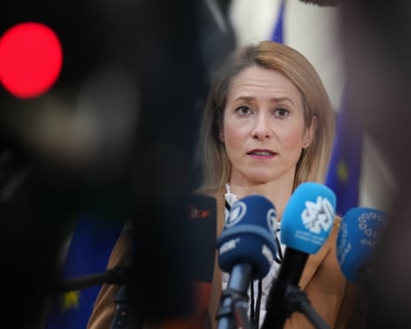 European Union foreign policy chief Kaja Kallas speaks with the media as she arrives for a meeting of EU foreign and defense ministers at the European Council building in Brussels.
