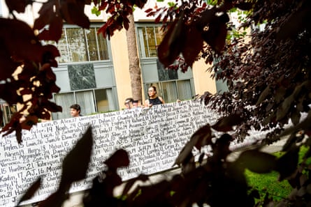 people holding a sign