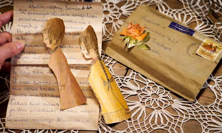 Letter, handmade rose and two paper dolls.