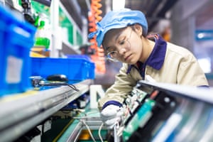 A worker inspecting an elevator signal system at a factory of Jiangsu WELM Technology last month