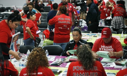 Members of the Culinary Union prepare packets before canvassing for Democratic candidates in Las Vegas on 17 October.