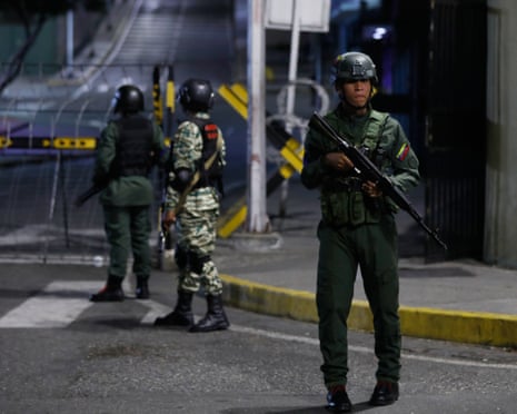 Soldiers guard the area around the Miraflores presidential palace.